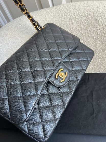 Chanel Jumbo Double Flap in Black Caviar with gold hardware (RRP £9830)