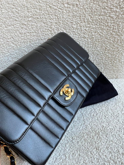 Chanel Medium Black Vertical Quilted Lambskin Vintage Classic Flap Bag with 24K gold hardware