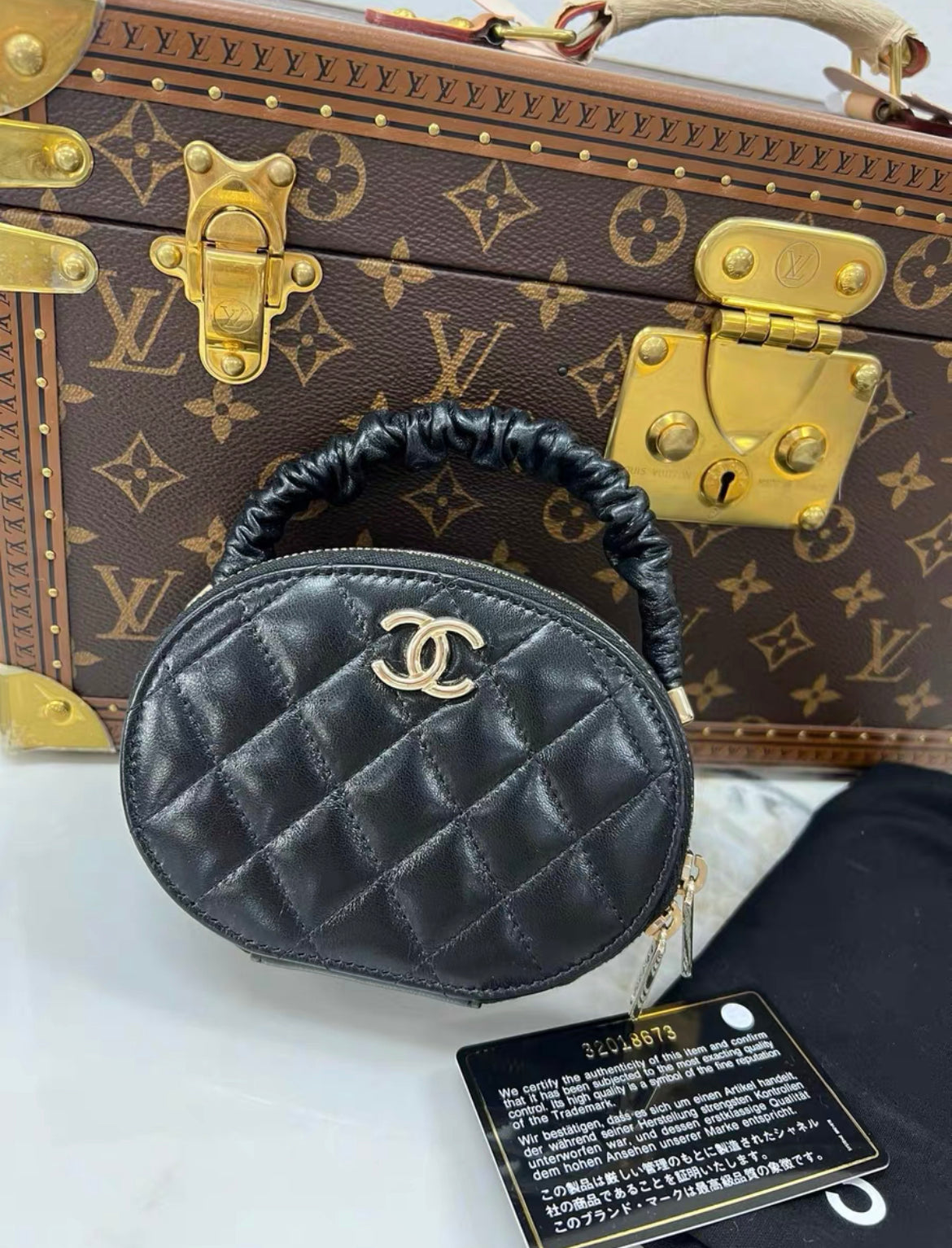Chanel Cc Ruched Oval Top Handle Quilted Lambskin Mini