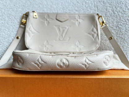 Louis Vuitton Multi Pochette Accessoires Creme Empreinte (RRP £2140)
