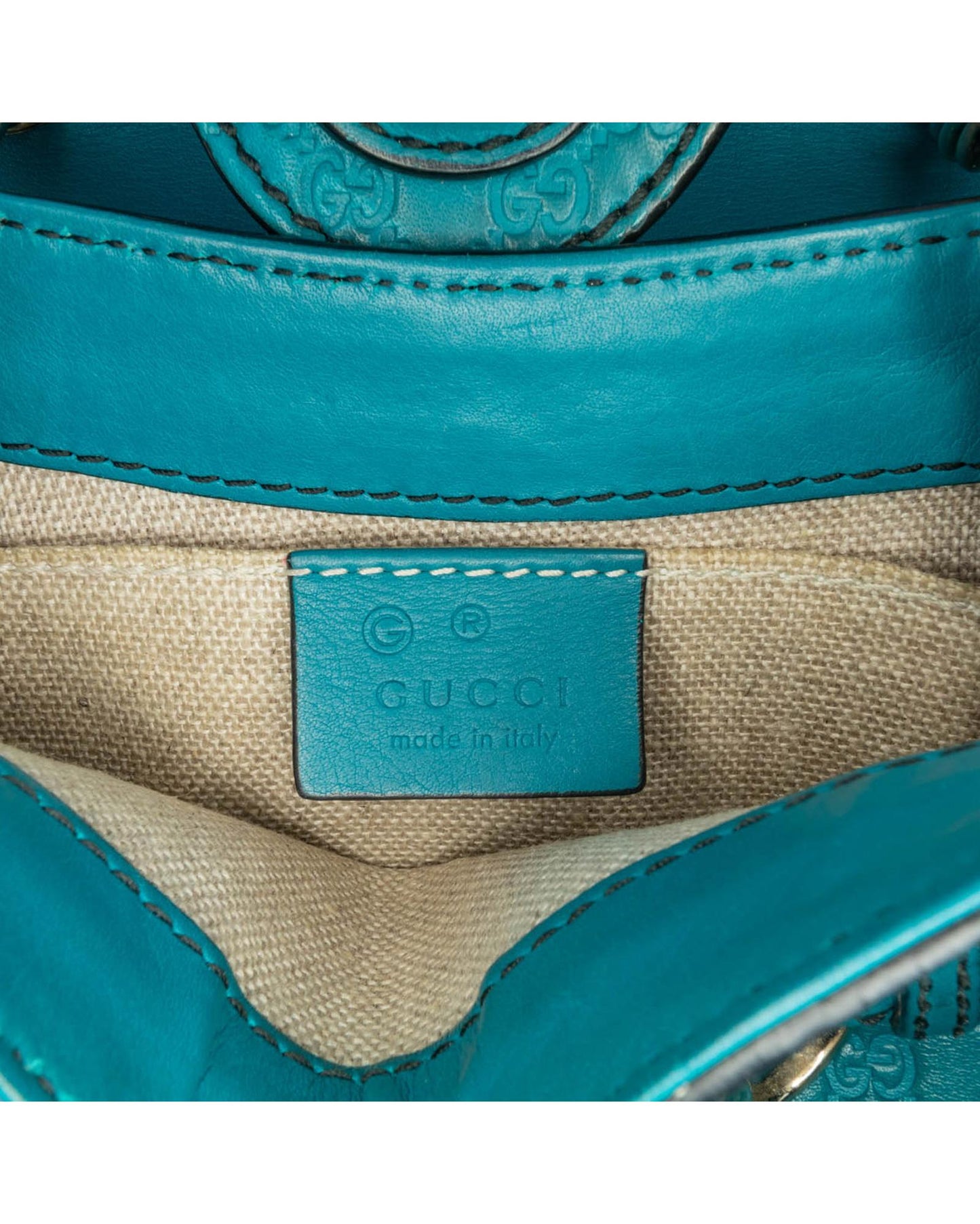 Mini Embossed Leather Crossbody with Chain Strap and Tassel Detail