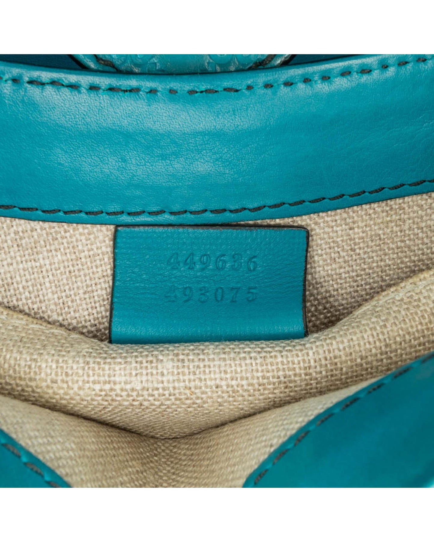 Mini Embossed Leather Crossbody with Chain Strap and Tassel Detail