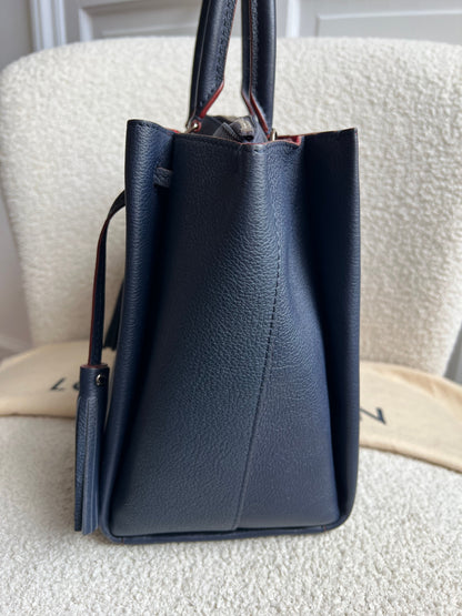 Louis Vuitton Lockmeto Bag in Marine Rouge