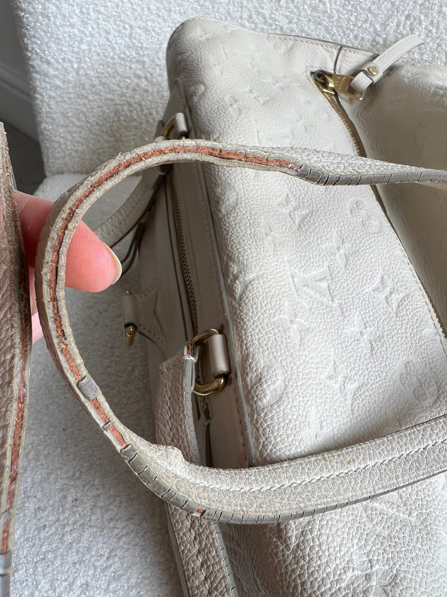 Louis Vuitton Inspiree in Cream Empreinte Leather with gold hardware