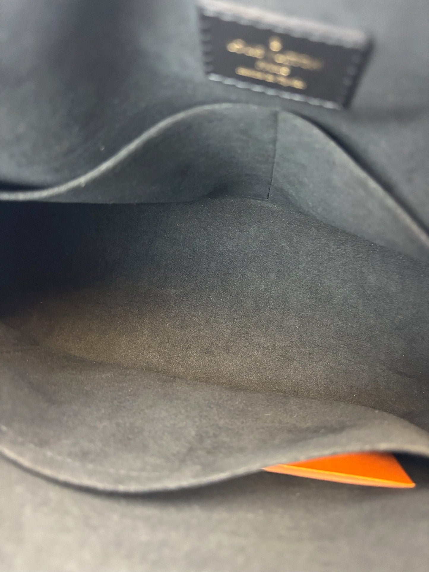 Louis Vuitton V Tote MM in Monogram Empreinte Leather
