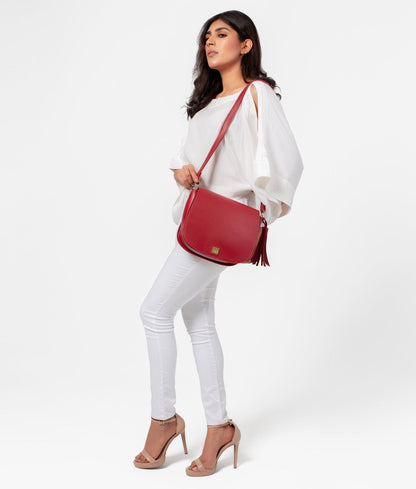 Maroon foldover saddle bag