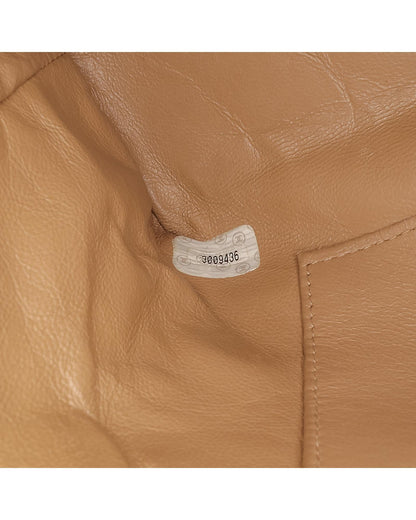 Quilted Lambskin Crossbody with Sun Charm and Chain Straps