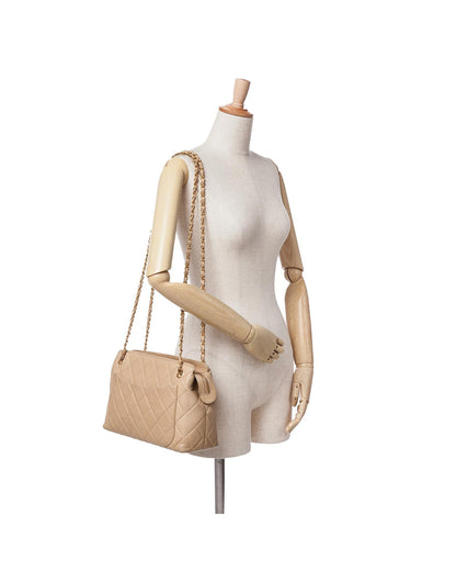 Quilted Lambskin Crossbody with Sun Charm and Chain Straps