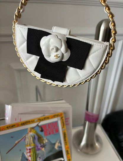 Chanel 23 White Quilted Leather Mini Round Camellia Clutch