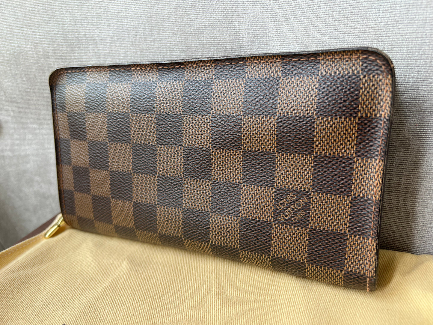 Louis Vuitton Zip Around Wallet in Damier Ebene and Brown