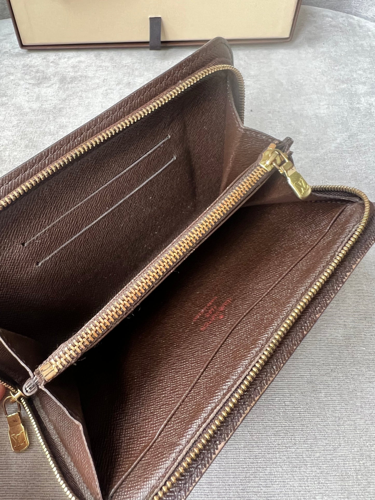 Louis Vuitton Zip Around Wallet in Damier Ebene and Brown