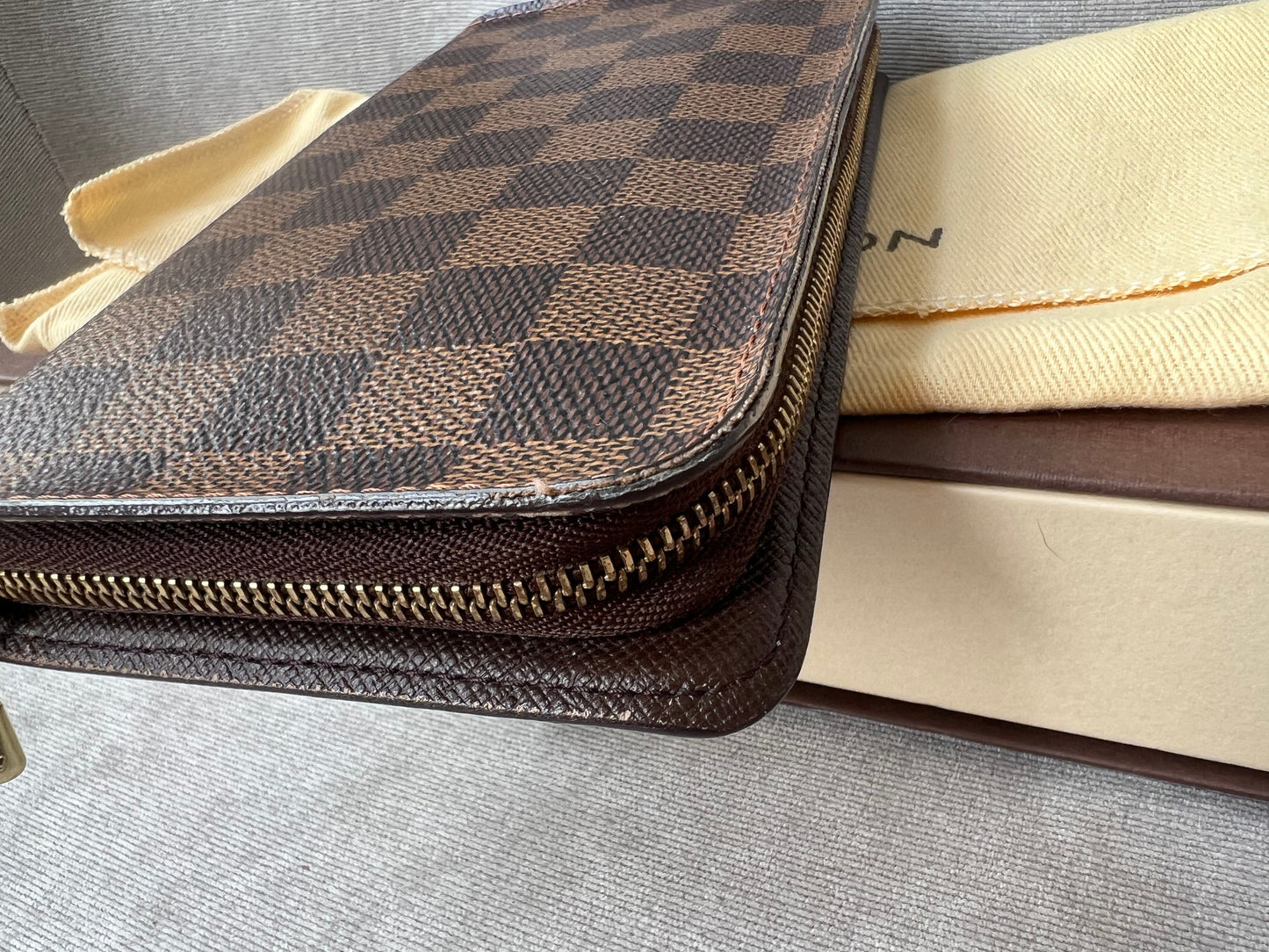 Louis Vuitton Zip Around Wallet in Damier Ebene and Brown