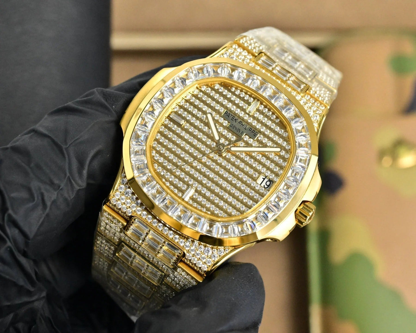 Patek Philippe Nautilus 40mm Yellow Gold Baguette Diamonds Watch