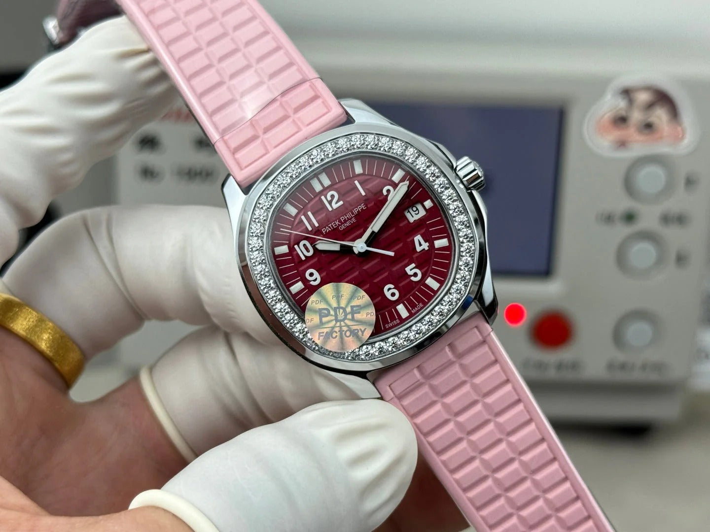 Patek Aquanaut 35.6mm Red Dial Pink Rubber Strap