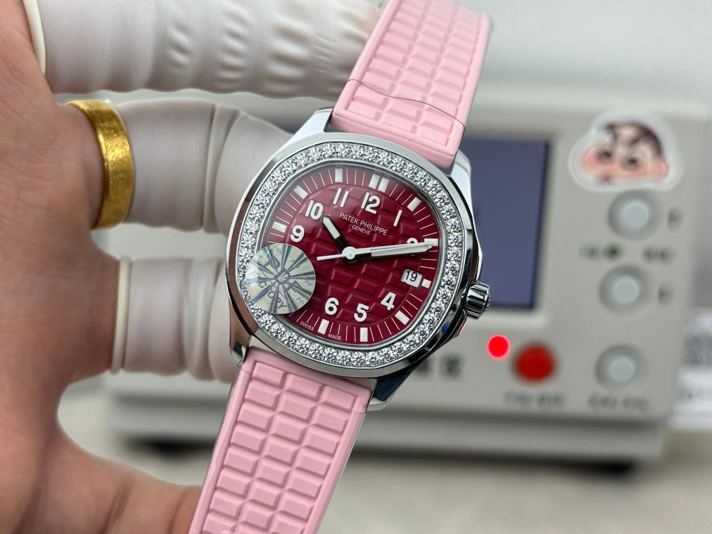 Patek Aquanaut 35.6mm Red Dial Pink Rubber Strap