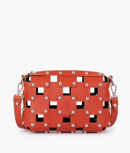Rust rivet cross-body bag