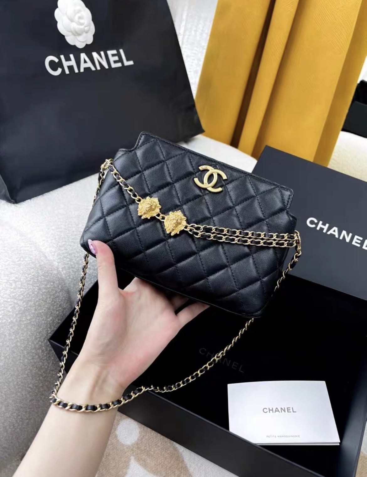 Chanel 23A Black And Gold Lion Emblem Chain Bag