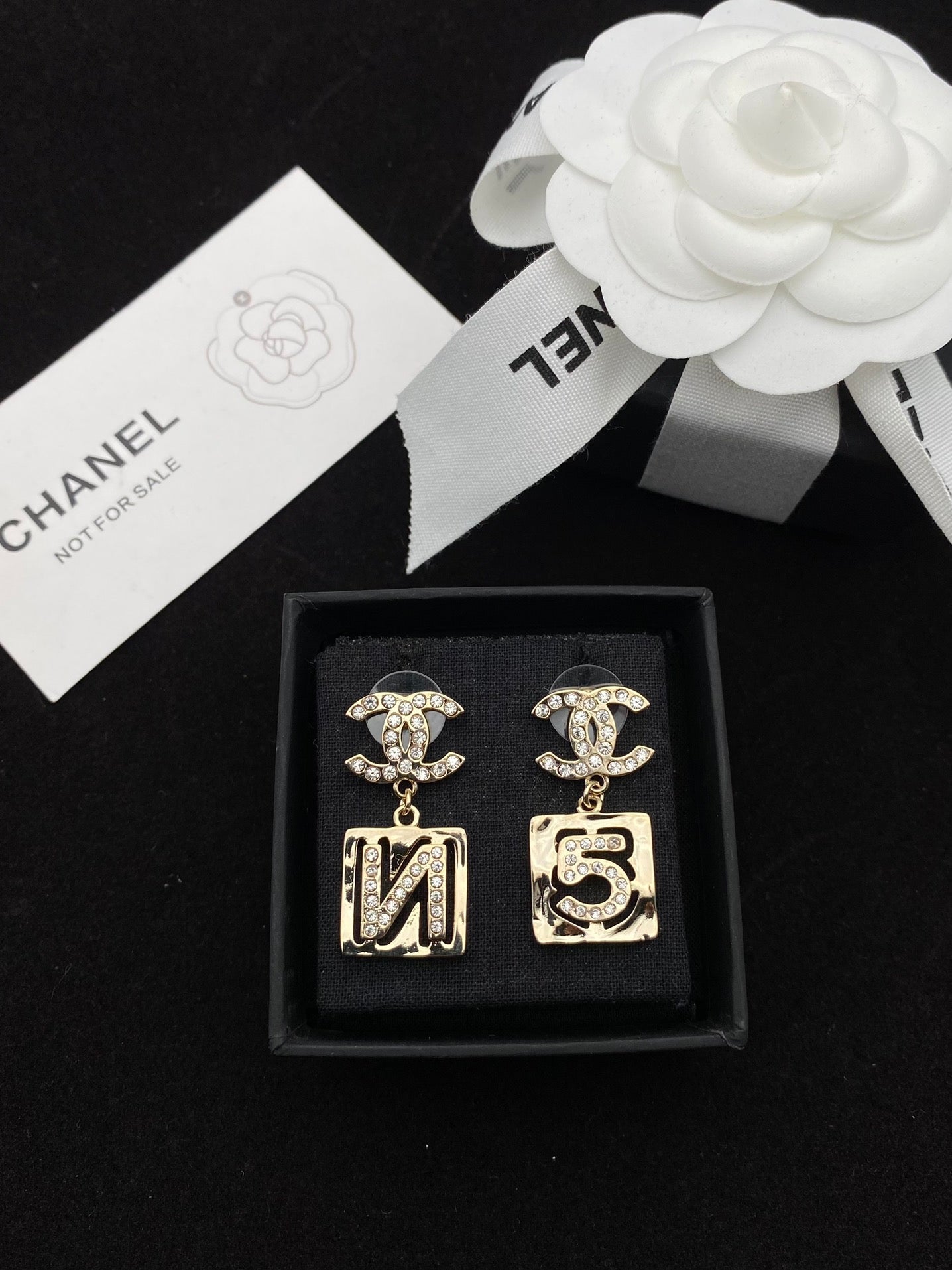 number 5 earrings