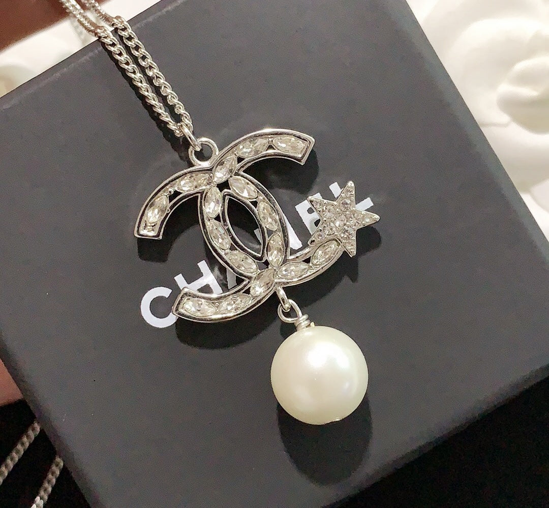 pentagram pearl earrings