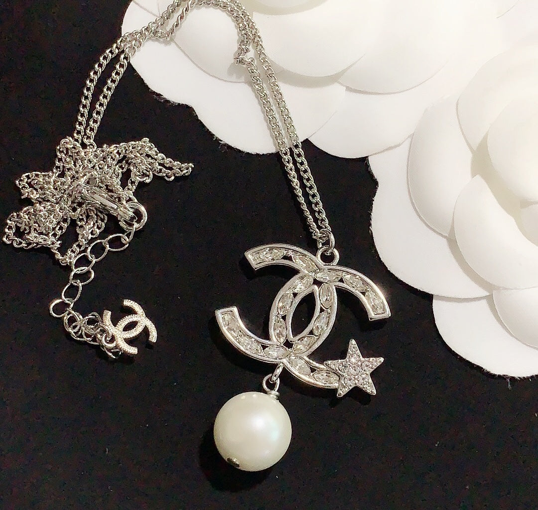pentagram pearl earrings